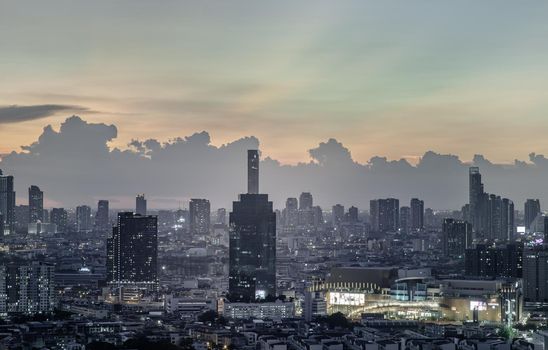 Bangkok, Thailand - Jun 01, 2021: Aerial view of Beautiful scenery view of Skyscraper Evening time Sunset creates relaxing feeling for the rest of the day. Selective focus.