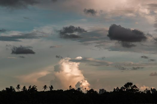 Evening view of the city with beautiful sky and clouds background. Selective focus.