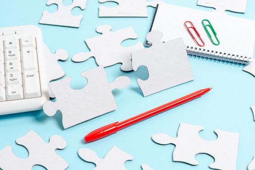 Building An Unfinished White Jigsaw Pattern Puzzle With Missing Last Piece