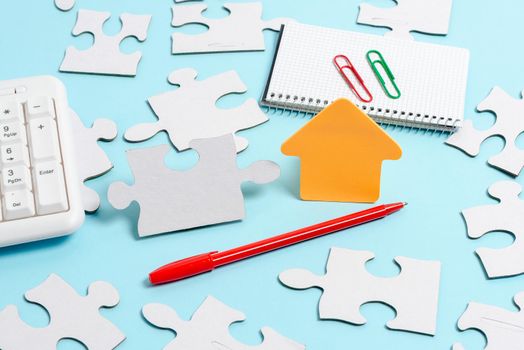 Building An Unfinished White Jigsaw Pattern Puzzle With Missing Last Piece
