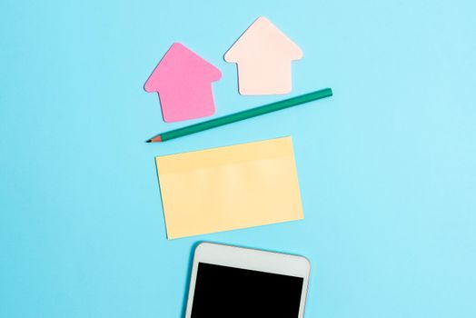 Display of Different Color Sticker Notes Arranged On Flat Lay Background