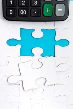 Building An Unfinished White Jigsaw Pattern Puzzle With Missing Last Piece