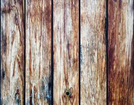 Wooden panels or floorboards showing weathered wood grain