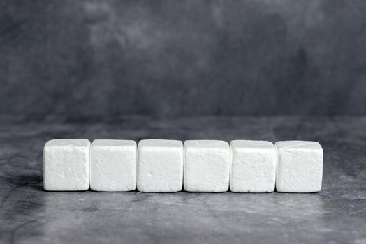 Stack of Sample Cube Rectangular Boxes On Surface Polished With Multi-Colour