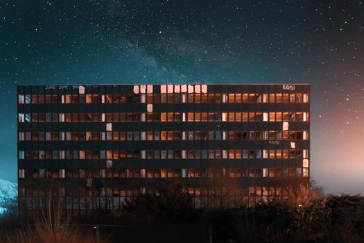 An old abandoned office building at night