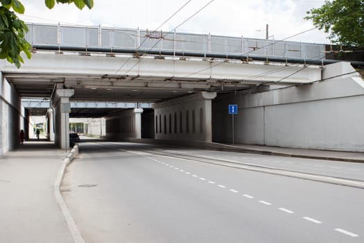 bridge over the highway in the city on sunny day