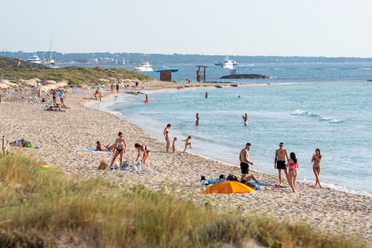 Formentera, Spain: 2021 June 13: Tourists enjoying the Illetes Beach in Formentera in Spain in times of Covid19