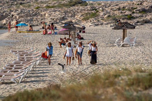 Formentera, Spain: 2021 June 13: Tourists enjoying the Illetes Beach in Formentera in Spain in times of Covid19