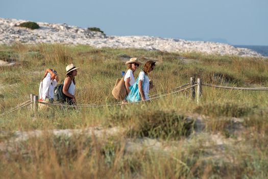 Formentera, Spain: 2021 June 13: Tourists enjoying the Illetes Beach in Formentera in Spain in times of Covid19
