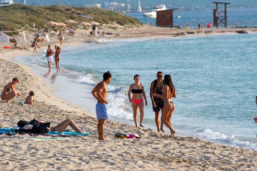 Formentera, Spain: 2021 June 13: Tourists enjoying the Illetes Beach in Formentera in Spain in times of Covid19