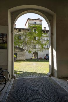 Gorizia, Italy. May 21, 2021. the arched entrance passage of the ancient Lantieri palace in the historic center of the city