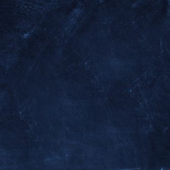 Grain blue paint wall background or texture