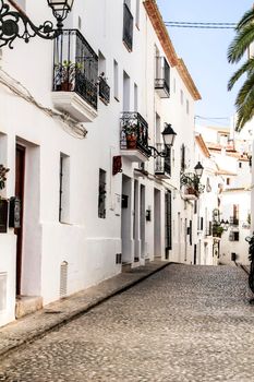 Narrow streets and beautiful whitewashed facades in Altea village, Alicante, Spain