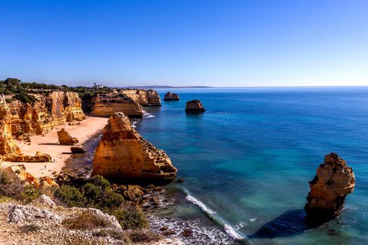 Beach and cliffs of Marinha, in Lagoa, Algarve, Portugal