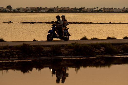 Formentera, Spain: 2021 June 14: People on Motorcycles in the Ses Salines Natural Park in Formentera, Spain in Times of covid19.