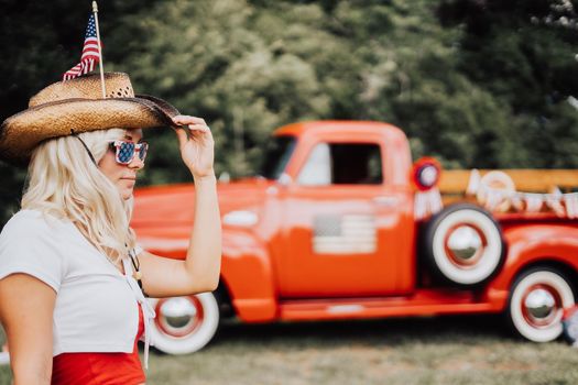 Couple in a vintage red truck