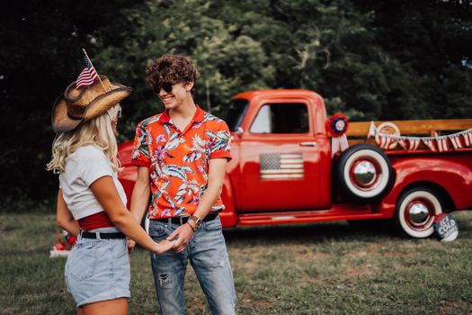 Couple in a vintage red truck