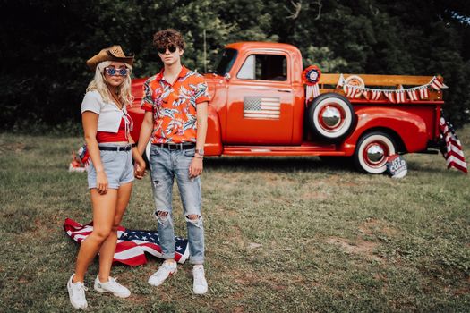 Couple in a vintage red truck