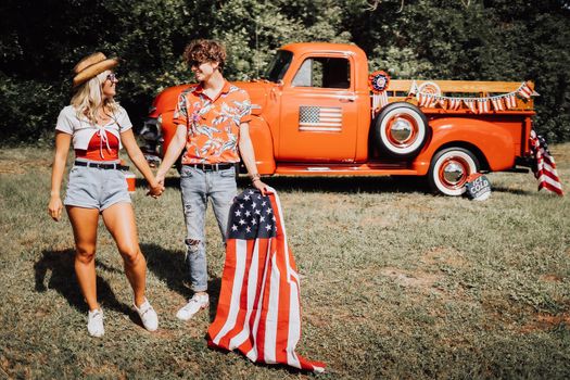 Couple in a vintage red truck