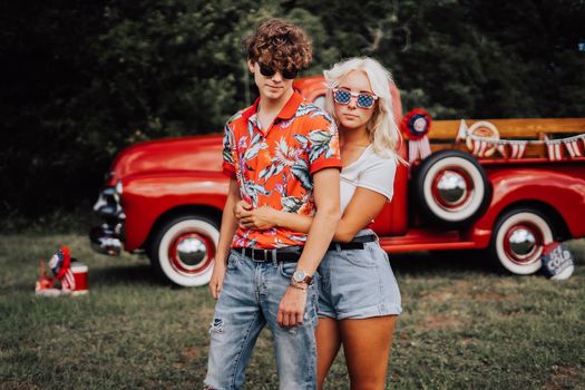 Couple in a vintage red truck