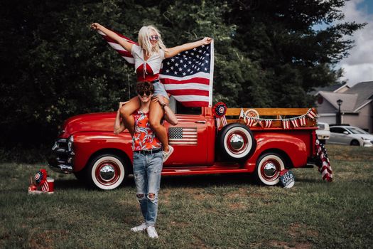 Couple in a vintage red truck