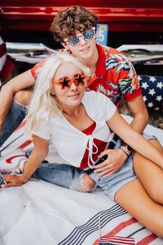 Couple in a vintage red truck