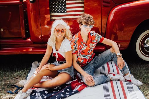 Couple in a vintage red truck