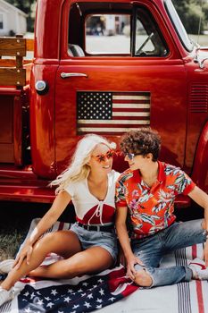 Couple in a vintage red truck