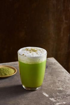 Matcha green tea latte in glass cup