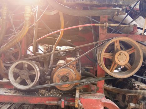 Close-up of detail of the mechanics of an industrial machine combine harvesters, Rotary combine harvester, Agricultural machinery. The machine for harvesting grain crops.