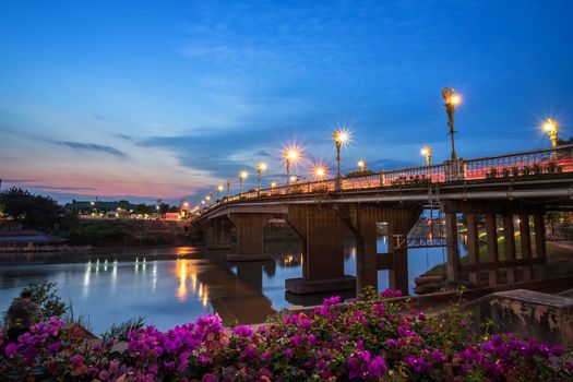 The color of Night traffic light on the road on the bridge (Eka Thot Sa Root Bridge) in Phitsanulok, Thailand.