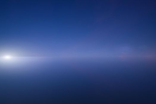 blue background, dark dramatic sunset sky texture and light.