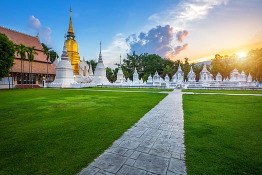 Wat Suan Dok is a Buddhist temple (Wat) at sunset sky is a major tourist attraction in Chiang Mai,Thailand.