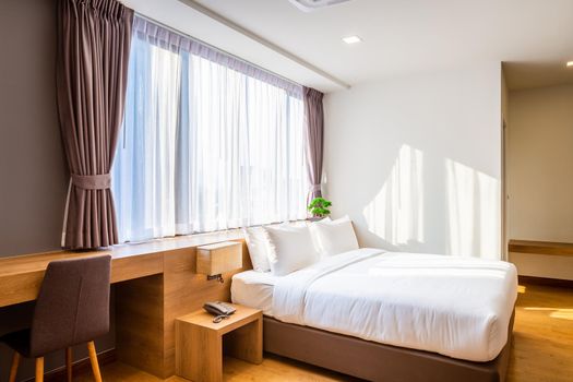 bedroom interior with bed and light lamp decoration.