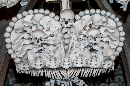 Kutna Hora, Czech Republic, February 19, 2014: Detail of the coat of arms of the Schwarzenberg family composed of bones, the ossuary in Sedlec in Kutná Hora