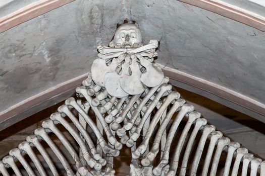 Kutna Hora, Czech Republic, February 19, 2014: Detail of a decoration composed of bones in the ossuary in Sedlec in Kutna Hora