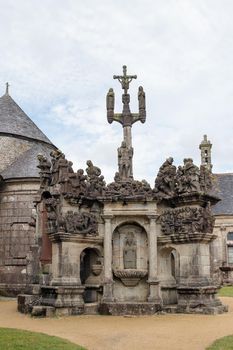 Guimiliau, France, August 8, 2019: The Calvary in Guimiliau Parish close
