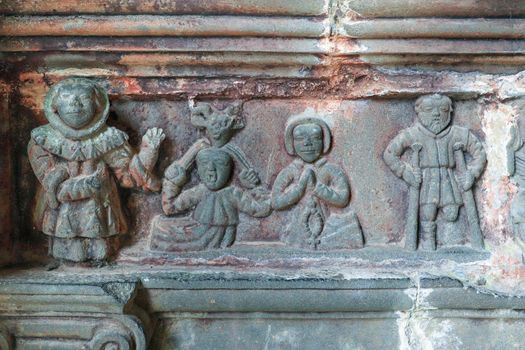 Saint Yves blesses unfortunates - the frieze inside the south porch of church Saint-Miliau