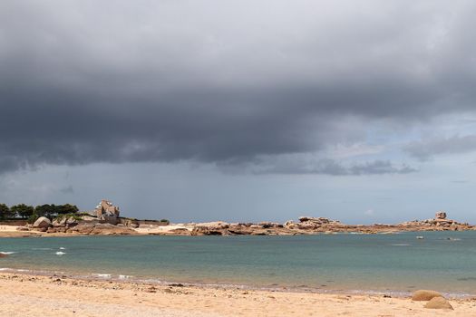 France, Tregastel, August 11, 2019: View from the beach on the island of Renote in Brittany