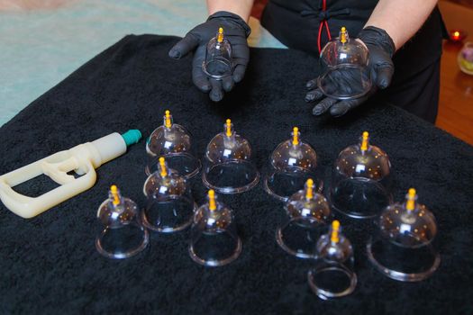 Vacuum vessels for the curative procedure of hijama bloodletting. Bloodletting, phlebotomy, sucking out dead blood cells