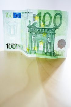 100 euros in official banknotes. No people