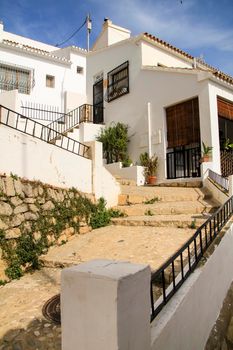 Narrow streets and beautiful whitewashed facades in Altea village, Alicante, Spain
