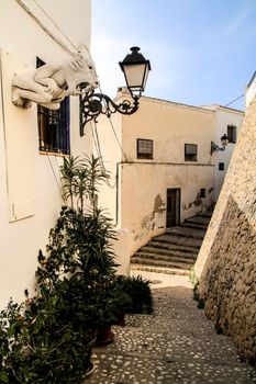 Narrow streets and beautiful whitewashed facades in Altea village, Alicante, Spain