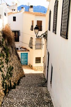 Narrow streets and beautiful whitewashed facades in Altea village, Alicante, Spain