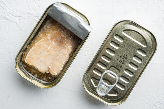 Canned Wild Alaska Salmon set, in tin can, on white background, top view flat lay