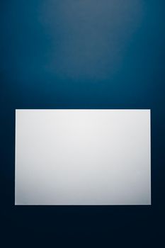 Blank A4 paper, white on blue background as office stationery flatlay, luxury branding flat lay and brand identity design for mockup.