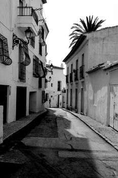 Narrow streets and beautiful whitewashed facades in Altea village, Alicante, Spain