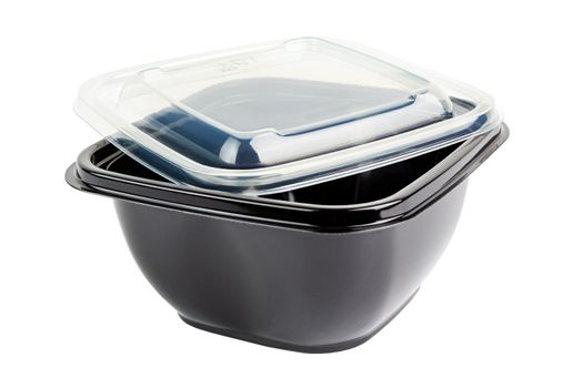 Black opaque single-use PET - Polyethylene terephthalate - plastic food take out container with tranparent cover, isolated on white background