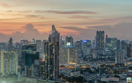 Bangkok, Thailand - Jun 02, 2021: Aerial view of Beautiful scenery view of Skyscraper Evening time Sunset creates relaxing feeling for the rest of the day. Selective focus.