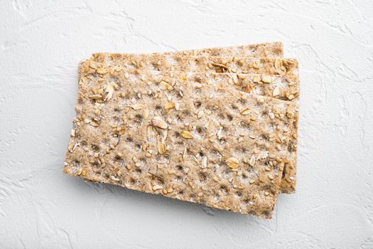 Crunchy crispbread Healthy snack set, on white stone table background, top view flat lay